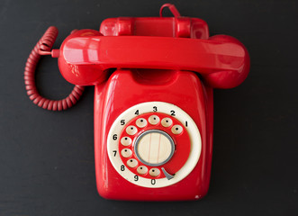 Red Retro Vintage Telephone on Black Background