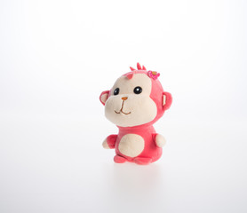 Fototapeta premium toy or monkey soft toy on the background.