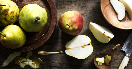 Aerial view of fresh pears on wooden table