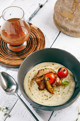 Mushroom Soup with Garlic and Cherry Tomato
