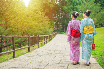Young asian girls walking on osaka street