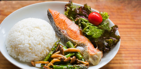 Sea Fish Fried ,white rice,fried vegetables and vegetable salad