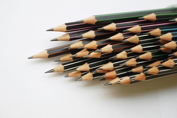 Group of pencils on white paper