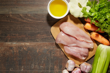 Healthy Food & drink diet Italian lifestyle: Mediterranean fruits vegetables herbs spices. Top view. Wooden rustic background. Free space text layout