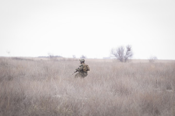 CAPU MIDIA, ROMANIA - MARCH 18: US and Romanian soldiers take part at a NATO military exercise, on...
