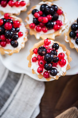 Homemade currant tart pie on wooden table