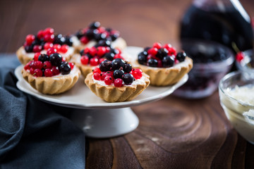 Homemade currant tart pie on wooden table