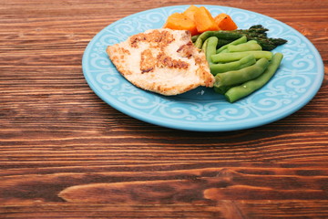 Roast turkey fillet with asparagus pumpkin and green beans