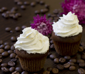Cupcakes with creame and coffee beans.