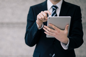 young businessman using a tablet PC.