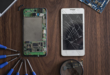 Phone screen cracking Waiting for repair on the tool table