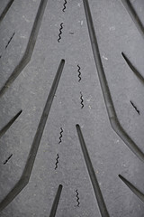 Fototapeta premium Motorcycle tyre treads are designed to give good wet grip but the road surface also plays a significant role in tyre to road adhesion