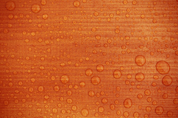 Water drops on wooden background pattern