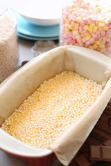 Baking dish with delicious rice dessert on table