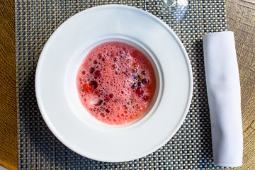 Various berries, strawberries, cherries, blueberries, lie in the plate for the fruit soup..