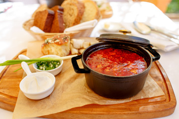Russian or Ukrainian borscht with a cast iron pot.
