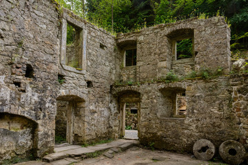 Fototapeta na wymiar Interior medieval mill Dolsky Mlyn in the Bohemian Switzerland National Park, medieval ruins in eastern Europe