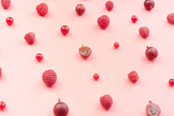 Berries isolated over pink background table.