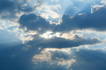 Fototapeta na wymiar The image of the sky where the Sun's rays shine through the clouds. Background