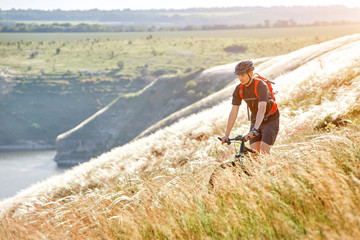 Traveler has adventur on meadow on riverside