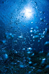 Rising Bubbles in Deep Underwater
