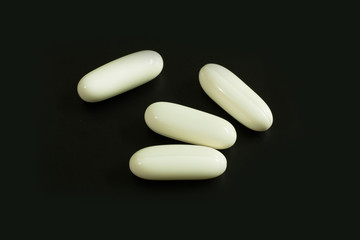 The White capsules image close up