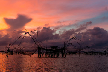 Fototapeta na wymiar Yor building is traditional local fisherman used net fishing in Pakpra Thale Noi, one of the country's largest wetlands covering Phatthalung, Nakhon Si Thammarat and Songkhla ,South of THAILAND.