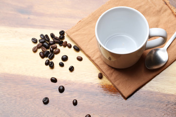 empty white coffee cup on wood background