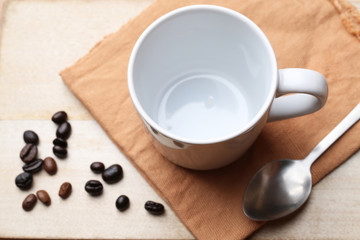empty white coffee cup on wood background