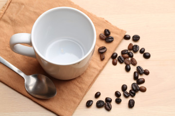 empty white coffee cup on wood background