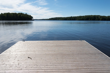 Wooden pier in river.