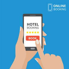 Design concept of hotel booking online. Hand holding smartphone with book button on screen