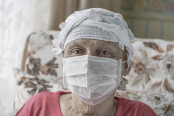 cancer woman wearing mask after chemotherapy