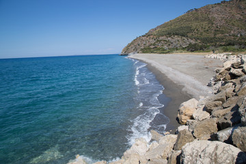 Fototapeta na wymiar Lonely natural beach in the Nature Reserve Laghetti di Marinello, late spring