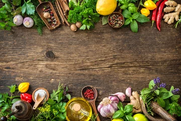 Foto op Canvas Fresh herbs and spices on wooden table © Alexander Raths