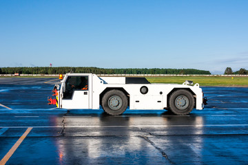 Aircraft tow truck at the airport apron
