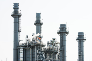 Petrochemical plant in silhouette image at sunset,Glow light of petrochemical industry on sunset and Twilight sky ,Power plant,Energy power station area