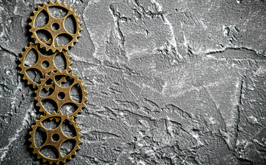concept hour metal gears on dark background top view