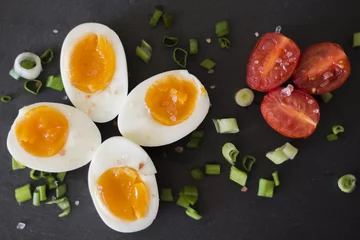Foto auf Leinwand Boiled eggs with vegetables © Adriana Nikolova