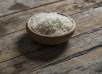 Raw white rice in a bowl 