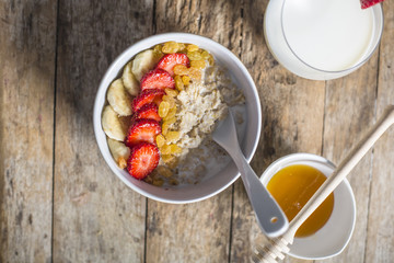 Oatmeal porridge with strawberry and banana 