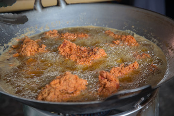 Fried chicken in progress