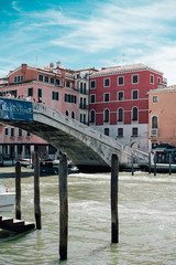 Fototapeta na wymiar View on venetian Grand Canal with ancient buildings and bridge in Venice