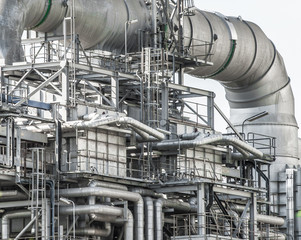 Industrial zone,The equipment of oil refining,Close-up of industrial pipelines of an oil-refinery plant,Detail of oil pipeline with valves in large oil refinery.