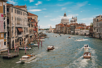 View on venetian Grand Canal with ancient buildings and bridge in Venice
