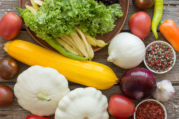 Vegetables on vintage wood background - autumn harvest. Rural still life