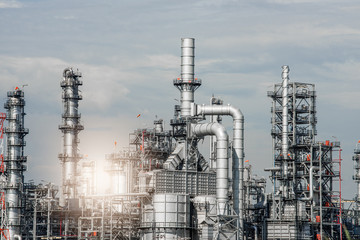 Industrial zone,The equipment of oil refining,Close-up of industrial pipelines of an oil-refinery plant,Detail of oil pipeline with valves in large oil refinery.
