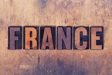 France Theme Letterpress Word on Wood Background