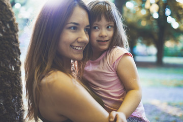 Naklejka premium Picture of mother and child with special needs