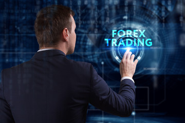 Business, Technology, Internet and network concept. Young businessman working on a virtual screen of the future and sees the inscription: Forex trading